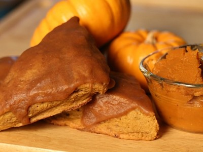 Pumpkin Scones An awesome treat for this fall! This is a delicious Pumpkin scone that melts in your mouth. Filled with pumpkin puree and spice to give it the extra oomph, the texture in this scone will make you come back for more. Remember to store scones in a container after 30 minutes of cooling to preserve the moisture.