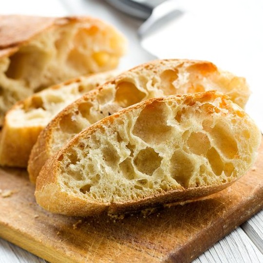 ciabatta bread A ciabatta is an italian yeast-leavened artisan and hearth-type bread that is made with a lean formula.