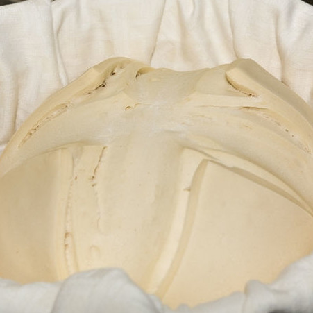 Lactic acid Lactic acid is the natural sourdough bread acid and is found in a variety of foods including pickles, beer, buttermilk and cheese.