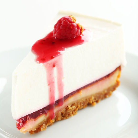 Cheesecake Cheesecake is made with a custard type filling and cookie or short dough as the base.