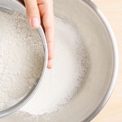 flour-mixing-sift Heat treated flour helps extend shelf life and improve product quality.